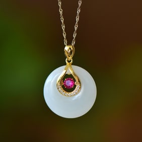 An Exquisite Sterling Silver-Gold Plated Inlaid White Jade Pendant