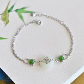 An Exquisite Sterling Silver Inlaid White Jade Bracelet