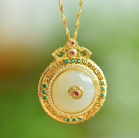 An Exquisite Sterling Silver-Gold Plated Inlaid White Jade Pendant
