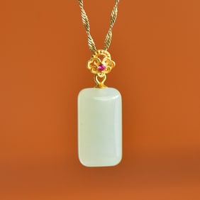 An Exquisite Sterling Silver-Gold Plated Inlaid White Jade Pendant