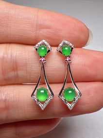 A Pair of Exquisite 18k Gold Diamond Inlaid Jadeite Earrings