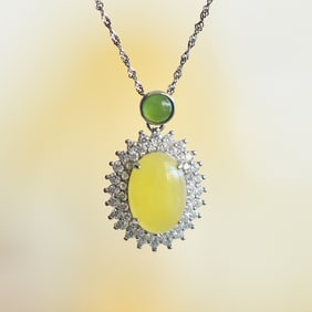 An Exquisite Sterling Silver Inlaid Amber Pendant