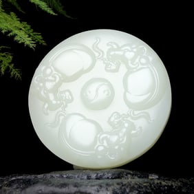 An Exquisite White Jade Buffalo Pattern Pendant