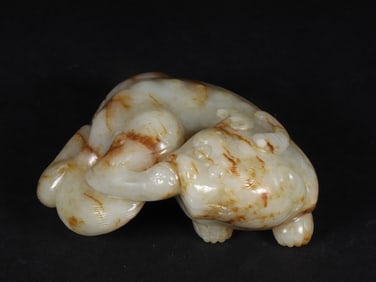 An Exquisite White Jade Auspicious Beast Ornament