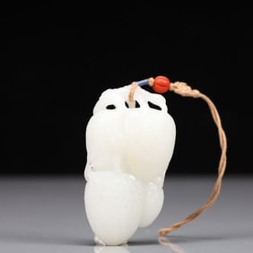 An Exquisite White Jade Flower and Fruit Pendant