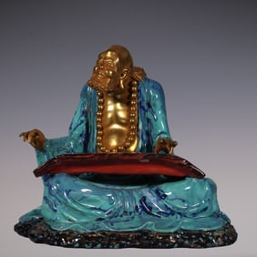 An Exquisite Robin's-Egg-Glazed Painted Gold Statue of Arhat Ornament