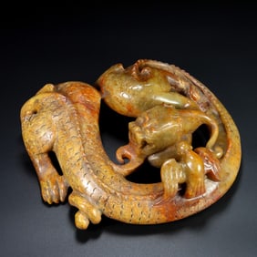 An Exquisite Archaic Jade Auspicious Beast Ornament