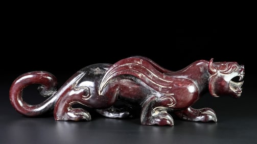 An Exquisite Archaic Jade Tiger Ornament
