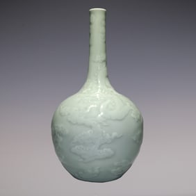 An Exquisite Celadon Glazed Dragon Pattern Vase