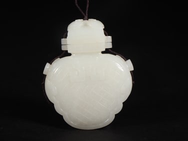 An Exquisite White Jade Pendant