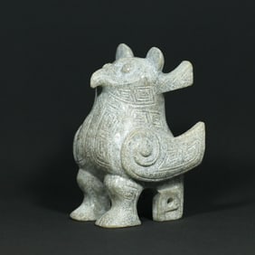 An Exquisite Archaic Jade Auspicious Beast Ornament