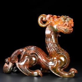 An Exquisite Archaic Jade Auspicious Beast Ornament