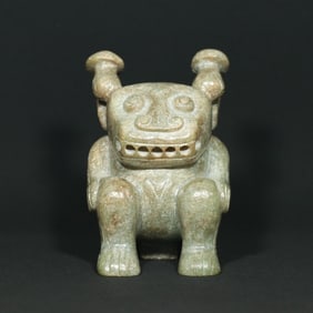 An Exquisite Archaic Jade Auspicious Beast Ornament