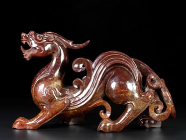 An Exquisite Archaic Jade Auspicious Beast Ornament