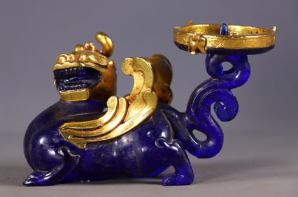 An Exquisite Glass Cover with Gold Lion Candlestick