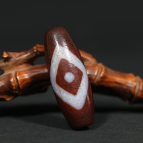 An Exquisite Archaic Jade Dzi Bead Pendant