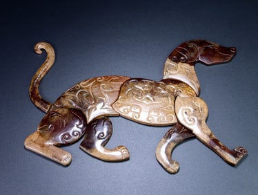 An Exquisite Archaic Jade Dog Ornament