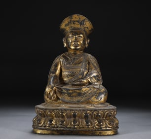 A Solemn Bronze Statue of Guru