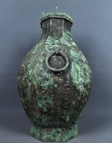 An Archaic Bronze Inscription Beast-Ears Pot