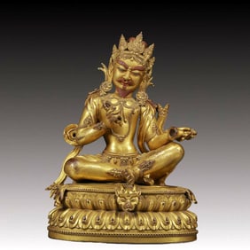 A solemn gilt bronze Vajra statue