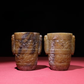 A Pair of Exquisite White Jade Hunting Pattern Cup