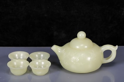 A Set of Fine White Jade Plum Blossom Pattern Teapot,With 4 Cups