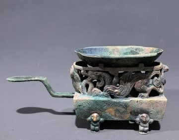 An Archaic Bronze Animal Pattern Food Vessel
