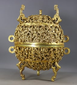 A Rare Gilt Bronze Hollow Dragon Pattern Tripod Censer