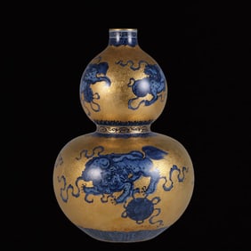 A Rare Gold Ground Blue and White Lion Pattern Gourd-Shaped Vase
