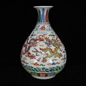 An Exquisite Blue and White Wucai Dragon Pattern Vase
