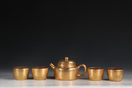 A Set of Fine Purple Sands Gilt Teapot