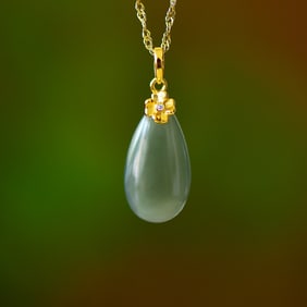An Exquisite Sterling Silver Inlaid Greenish Jade Pendant
