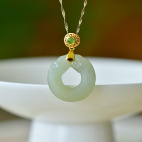An Exquisite Sterling Silver Inlaid Greenish Jade Pendant