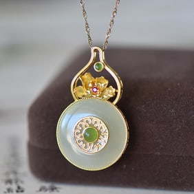 An Exquisite Sterling Silver Inlaid White Jade Pendant