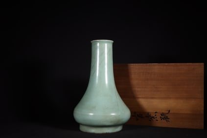 A Rare Guan Kiln Powder Blue Glaze Long-Neck Bottle