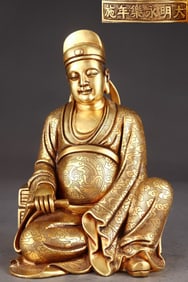 A Rare Red Copper-body Gilt Emperor Sitting Statue