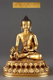 A Rare Red Copper-body Gilt Buddha Sitting Statue