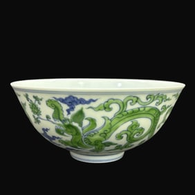 A Rare Doucai Kui Dragon Ejecting Lotus Pattern Bowl