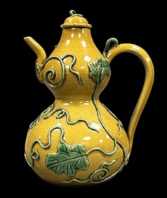 A Rare Yellow Glazed Carve Gourd-Shaped Bottle