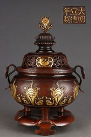 A Rare Red Copper-body Gilt Eight Treasures-pattern Double-handle Incense Burner