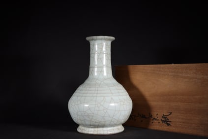 A Rare Guan Kiln Celadon (Qianlong Inscribed Poem) String Pattern Bottle