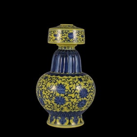 A Rare Yellow Glaze Blue and White Lotus Supporting Eight Treasures Pattern Vase