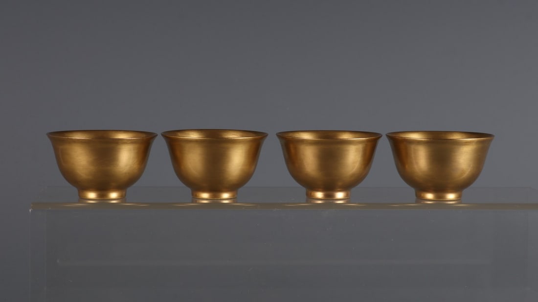 A Set of Rare Gilt Tea Cups: A Set of Rare Gilt Tea Cups,Qing Dynasty, China,Yongzheng Six-character Mark,Size:1.5inx2.4in 一套鎏金茶杯,中国清代,雍正六