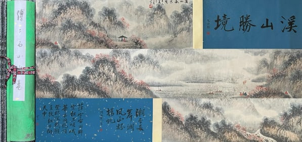 A Chinese ink wash paper scroll landscape hand scroll