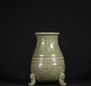 A Rare Yaozhou Kiln Celadon Carved Banana Leaf Lotus Pattern Beast Foot Bottle
