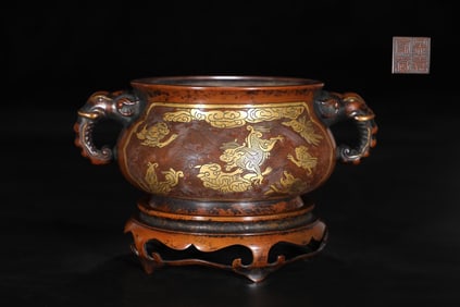 A Rare Bronze Body Gilt Sea Beast Design Elephant-head Handles Incense Burner