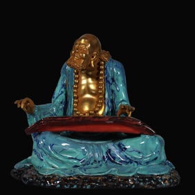 A Rare Lujun Glaze Gilt Arhat Sitting Statue