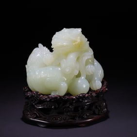 A Rare Hetian Jade Lion Ornament