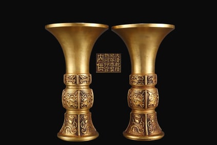 A pair of Rare red copper body gilt animal face pattern flower vase