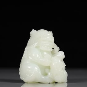 An Exquisite White Jade Lion Ornament